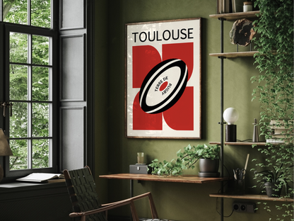 Affiche minimaliste de rugby avec un ballon stylisé et un design graphique aux couleurs de Toulouse. Parfaite pour les passionnés de rugby.